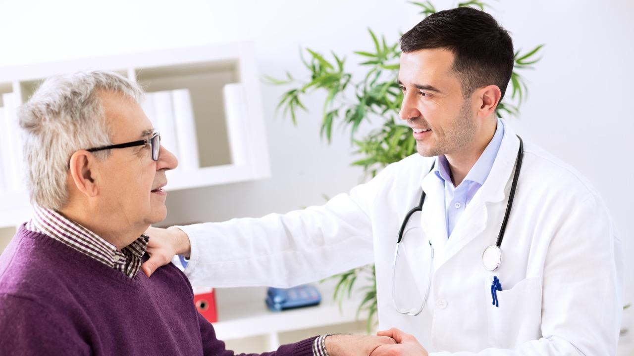 Doctor making eye contact with his patient.